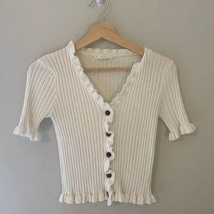 White ruffle button up top